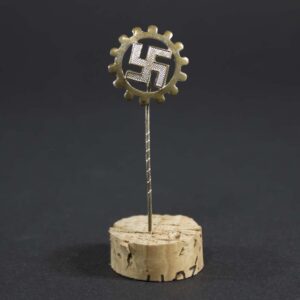 ront view of original DAF membership pin from Nazi Germany, showing German Labour Front insignia and detail, in good condition.