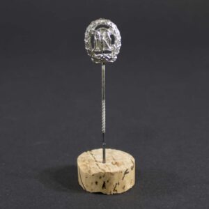 Front view of Silver DRL sports badge stickpin from Nazi Germany, showing detailed insignia and metallic finish, circa 1930/40s.