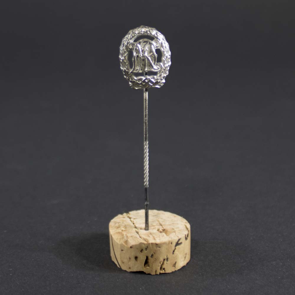 Front view of Silver DRL sports badge stickpin from Nazi Germany, showing detailed insignia and metallic finish, circa 1930/40s.