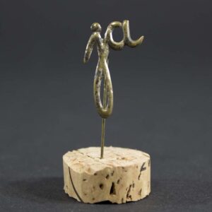 Front view of original NSDAP 1933 pin commemorating Germany’s withdrawal from the League of Nations and the Reichstag election, featuring Nazi-era insignia.