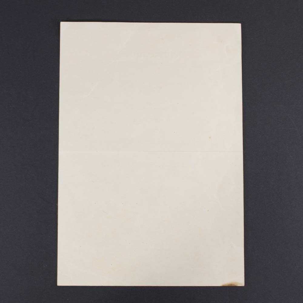 Reverse side of the Black Wound Badge award document, showing a blank or lightly marked surface, with visible aging and paper texture.