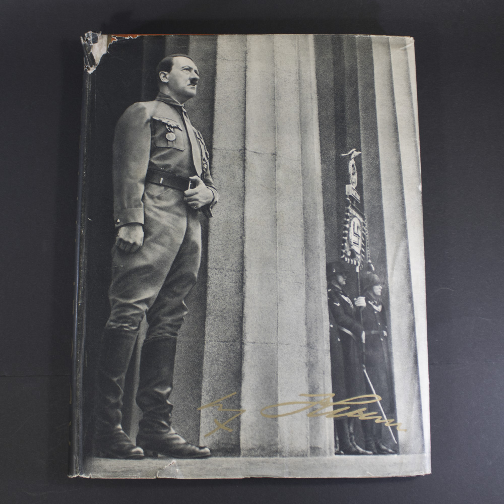 Cigarette album “Adolf Hitler” shown together with its original dust cover, both in excellent condition