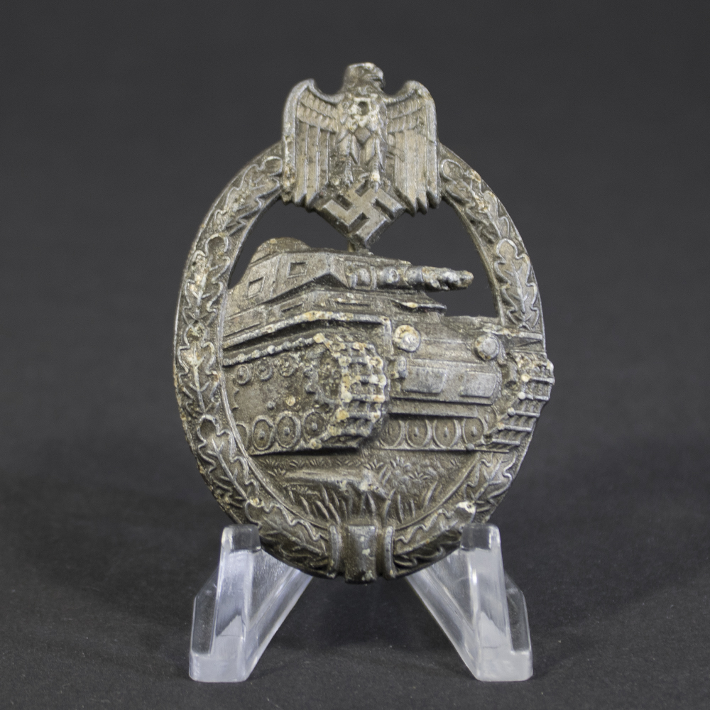 Full front view of original WWII German Panzer Assault Badge in bronze by Zimmermann, showing tank motif and wreath design with worn finish.