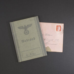 Front cover of an original WWII German Wehrpass, showing title and authentic period design