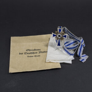 Bronze mothers cross with bag