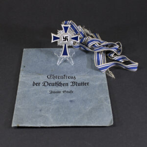 Silver mothers cross with bag