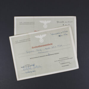 Overview of the 2 Reichsschwimmschein showing an German Eagle with swastika and German writing