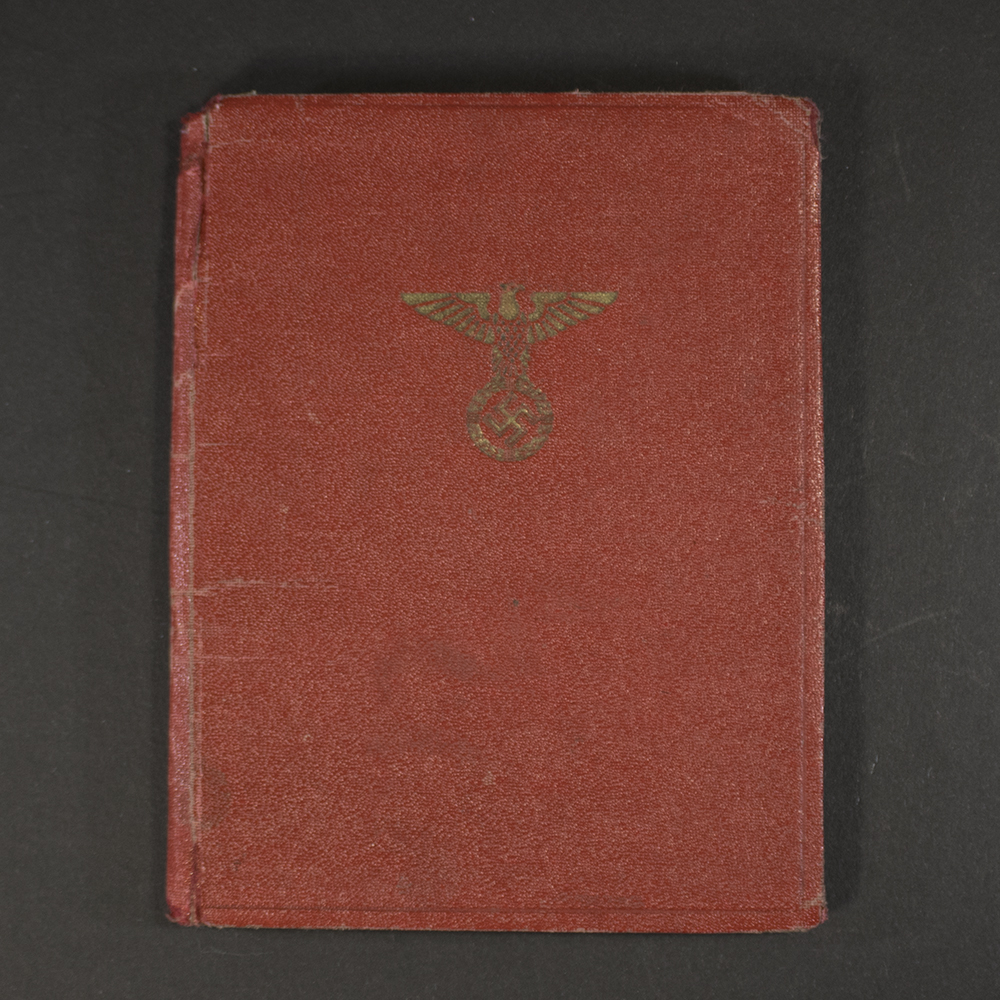 Front cover of an NSDAP membership book, featuring the party emblem