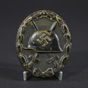 Full view of a WW2 Black Wound Badge, showing its oval shape and overall condition.