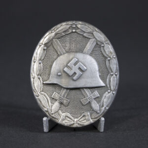 Full view of a WW2 Silver Wound Badge, showing its oval shape and overall condition.