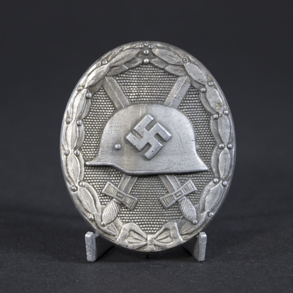 Full view of a WW2 Silver Wound Badge, showing its oval shape and overall condition.