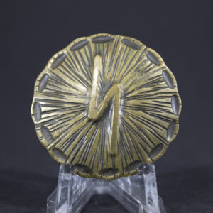 Front view of the item, showing main design details and surface texture.