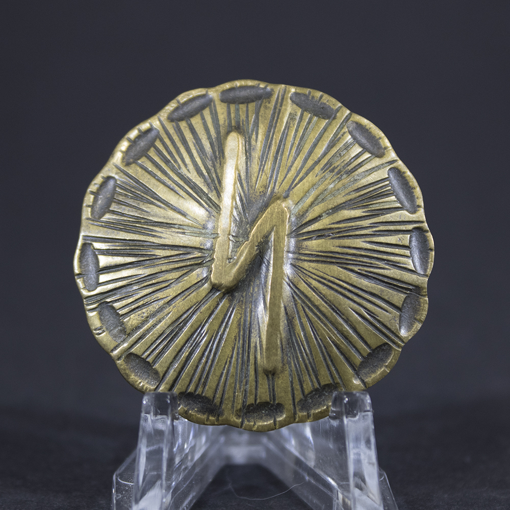 Front view of the item, showing main design details and surface texture.