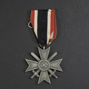 German War Merit Cross with swords, bronze Maltese-style cross displayed with ribbon
