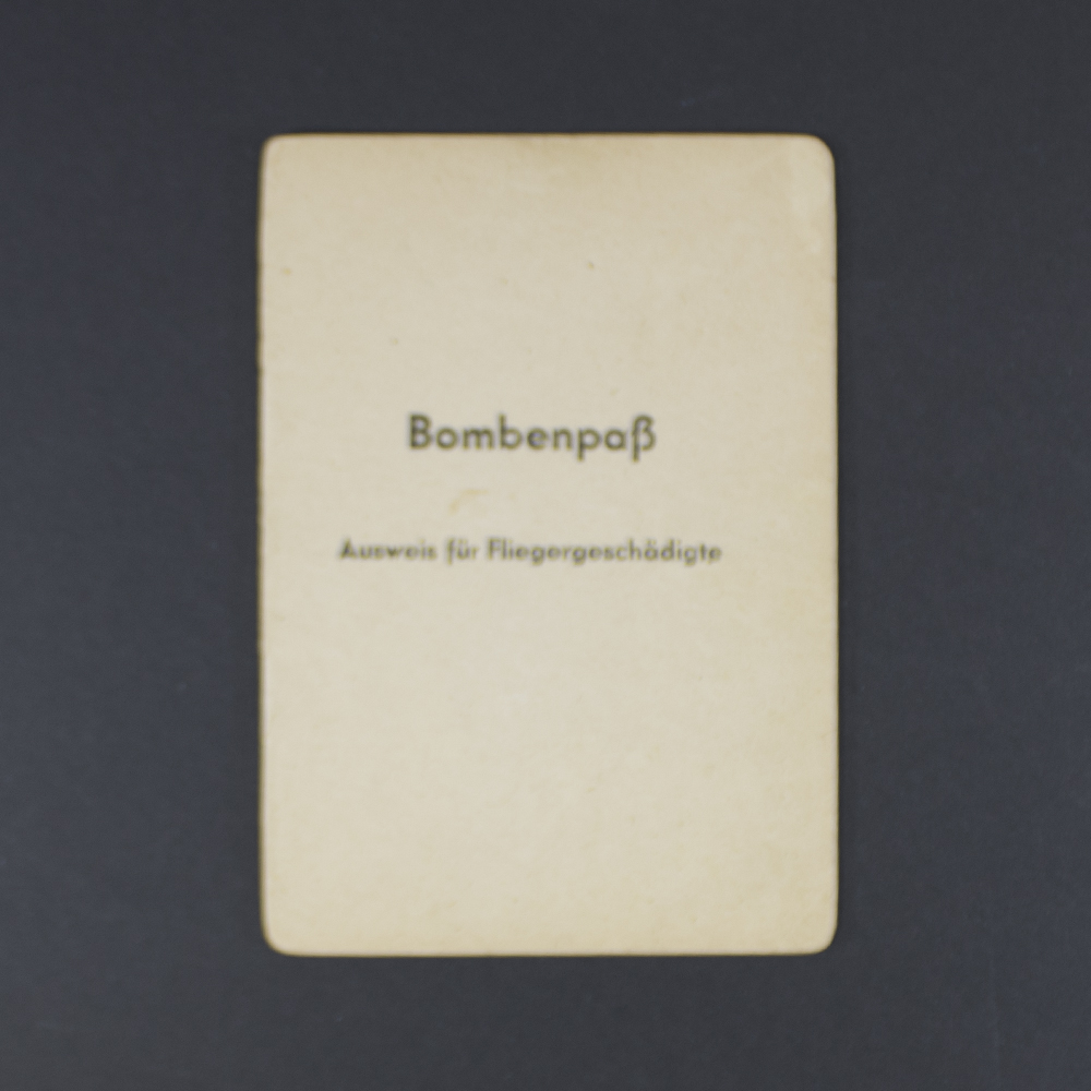 Front cover of the item, showing title in German script with emblem and aged texture.