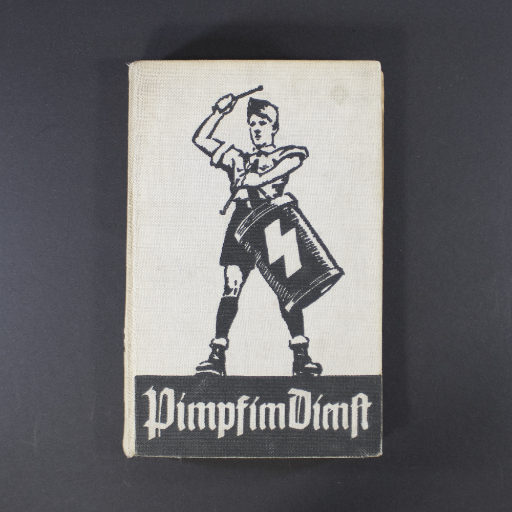 “Front cover of the book ‘Pimpf im Dienst,’ featuring a period-style illustration of a Hitler Youth boy in uniform, with bold German title text at the top.”
