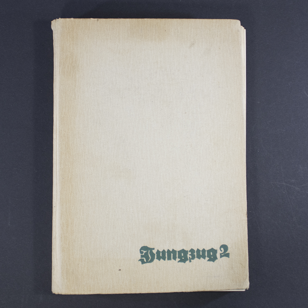 “Front cover of the book ‘Jungzug 2,’ featuring an illustrated scene of Hitler Youth boys in uniform, with bold German title text prominently displayed.”