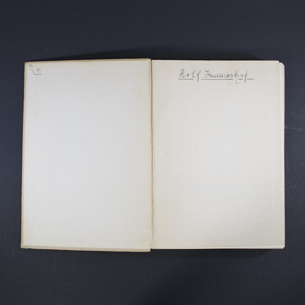 “First inside illustration from ‘Jungzug 2,’ showing a group of boys marching in formation, wearing uniforms and carrying flags.”