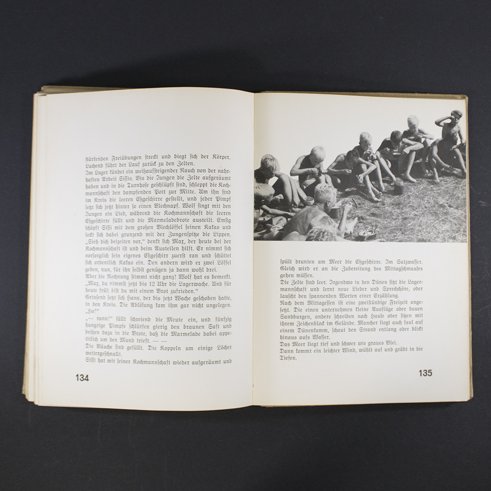 “seventh inside illustration depicting boys studying or reading, emphasizing education and ideological instruction.”