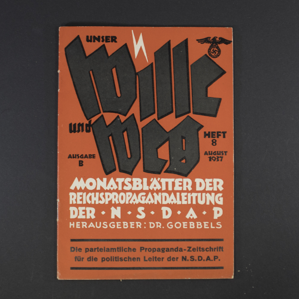 “Front cover of the NSDAP magazine ‘Unser Wille und Weg,’ featuring bold Gothic-style German title text and a period illustration or photograph related to Nazi propaganda themes.”