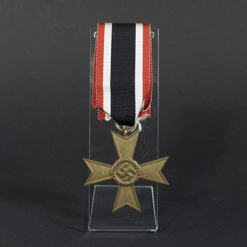A World War II German War Merit Cross without swords, shown in full view with its bronze finish and suspension ring at the top