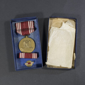 full overview of the medal inside its original presentation case