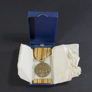 full overview of the medal in its original presentation case