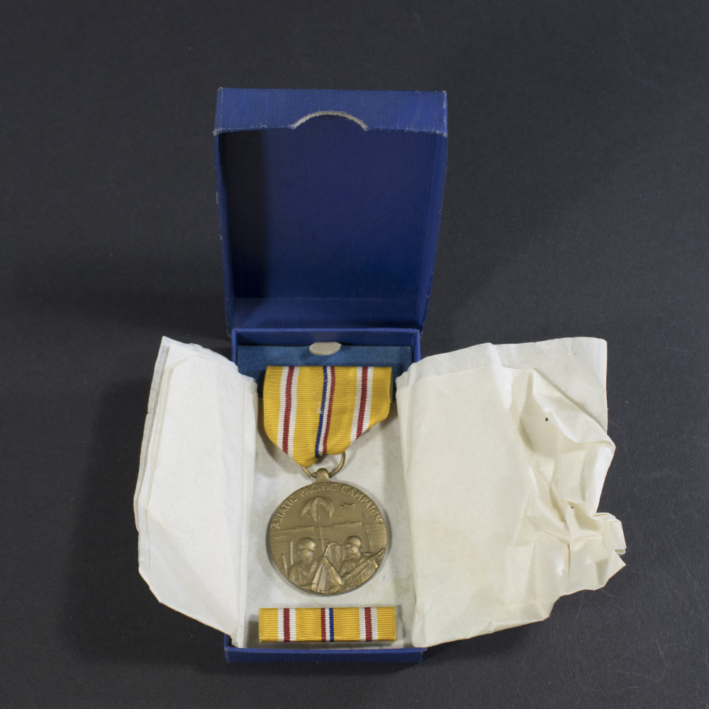 full overview of the medal in its original presentation case