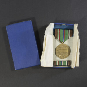 full overview of the medal inside its original presentation case