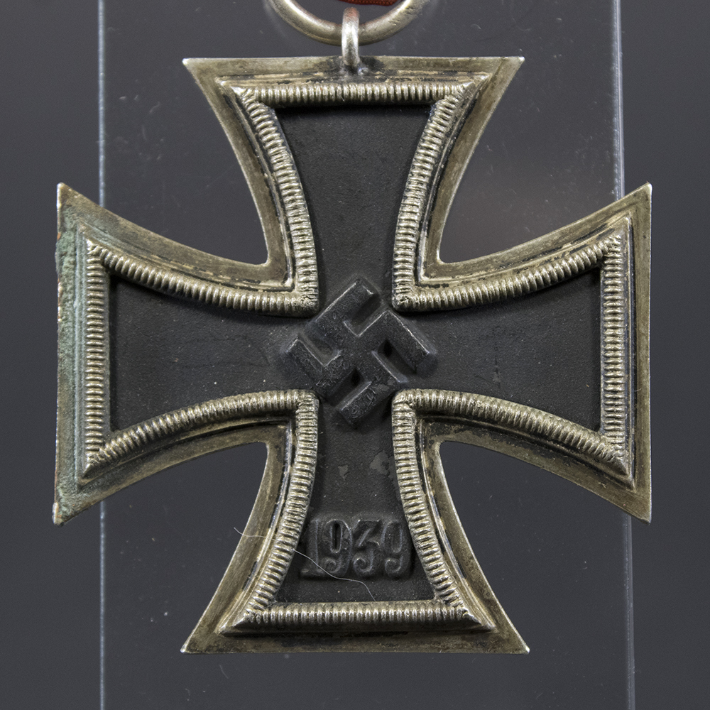 Front side of the WWII German Iron Cross 2nd Class medal, featuring the raised silver border, black core with central swastika, and ‘1939’ date at the bottom