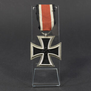 World War II German Iron Cross 2nd Class medal displayed flat, showing its blackened iron core with silver frame and suspension ring