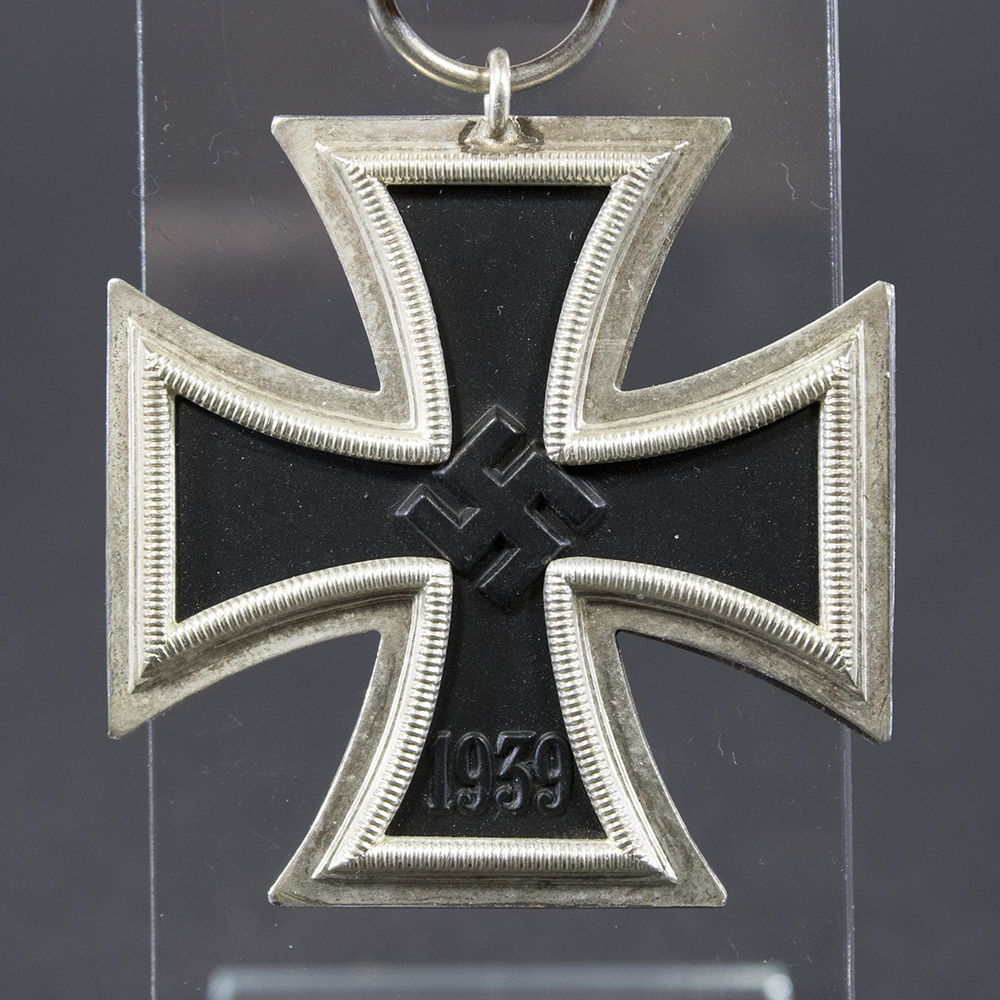 Front side of the WWII German Iron Cross 2nd Class medal, featuring the raised silver border, black core with central swastika, and ‘1939’ date at the bottom.