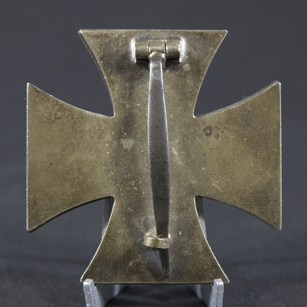 Reverse side of the German Iron Cross 1st Class, showing the pin assembly and smooth silver finish.