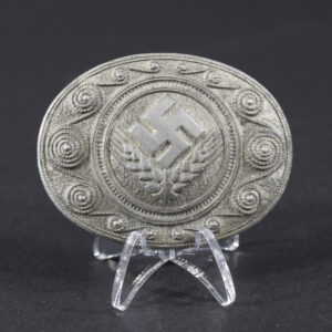 Front side of a World War II German RADwj brooch, showing the emblem with detailed design and visible symbols.