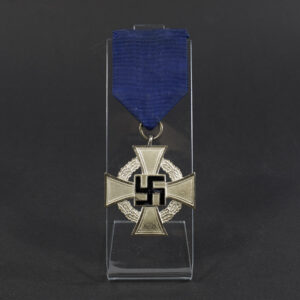 Overview of a WWII German 25 Years Faithful Service Medal, showing the cross-shaped medal suspended from its ribbon.