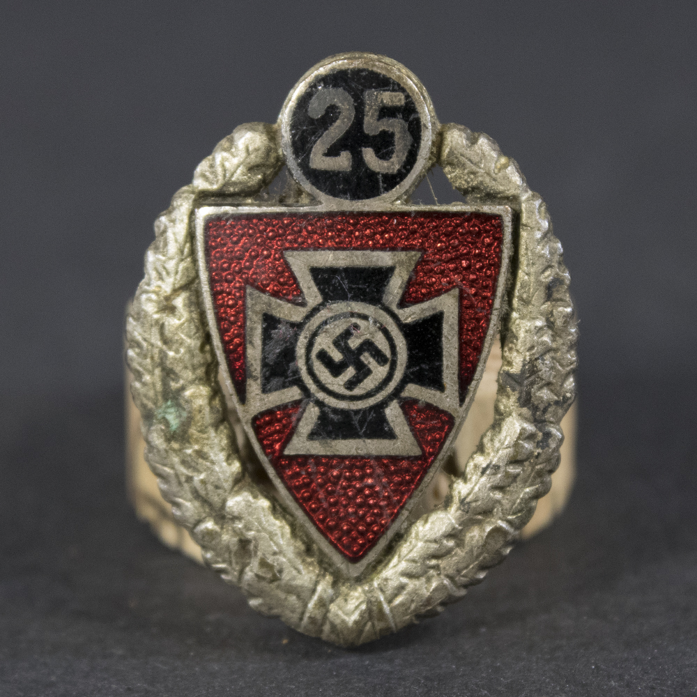 Front side of the Kyffhäuser 25-Year Membership Honor Pin, featuring the intricate design with raised lettering and decorative wreath motif.