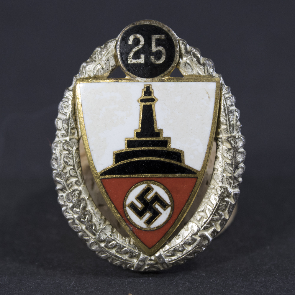 Front side of the Kyffhäuser 25-Year Membership Honor Pin, featuring the intricate design with raised lettering and decorative wreath motif.