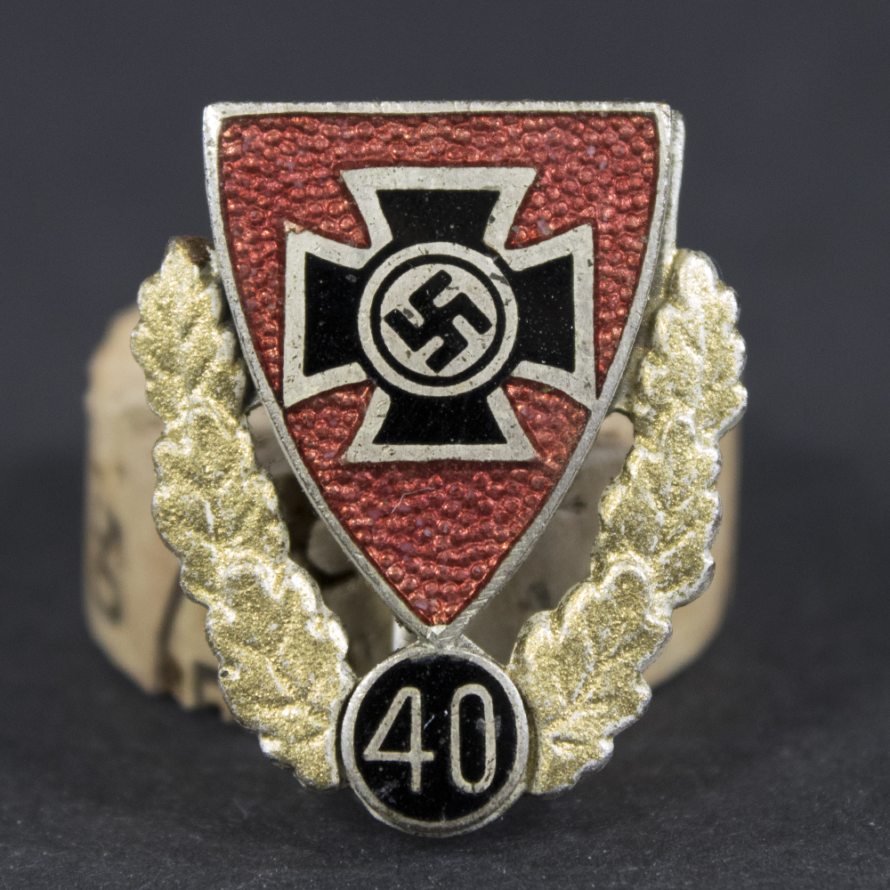 Front side of the Kyffhäuser 40-Year Membership Honor Pin, featuring the intricate design with raised lettering and decorative wreath motif.