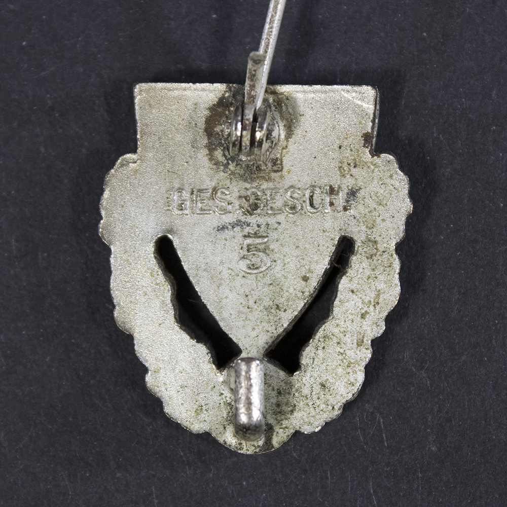 Back side of the Kyffhäuser 40-Year Membership Honor Pin, showing the smooth reverse surface and the stick pin attachment extending downward.