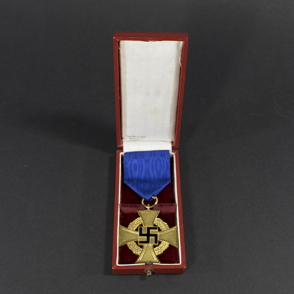 WWII German 40 Years Faithful Service Medal displayed inside its original presentation case, showing the medal and ribbon neatly arranged.
