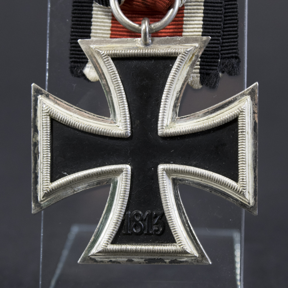 Close-up of the reverse of a WWII Iron Cross 2nd Class, showing the plain back with date.
