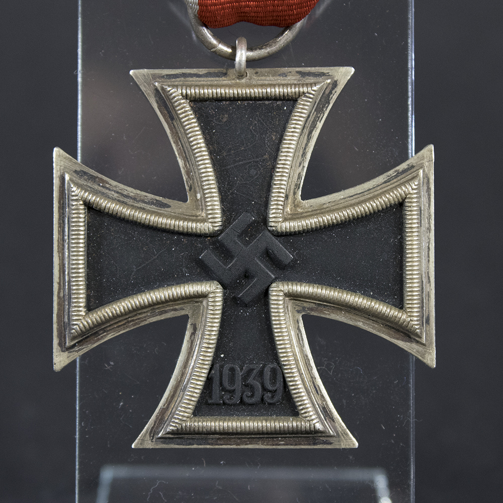 Close‑up of the front side of the Iron Cross 2nd Class, showing the central swastika emblem, 1939 date, and detailed frame