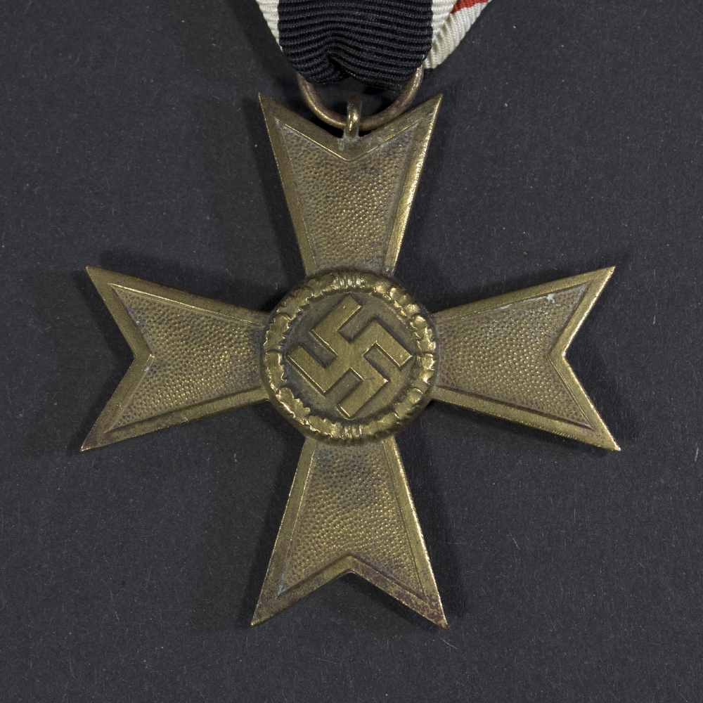 Close-up of the front of the WW2 War Merit Cross without Swords, displaying the detailed bronze cross with the raised ‘1939’ date in the center.