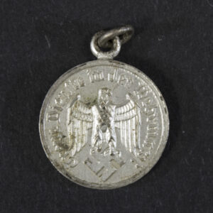 Front view of a WW2-era German 4 Year Wehrmacht Service Medal miniature (15 mm), showing the medal design and finish.