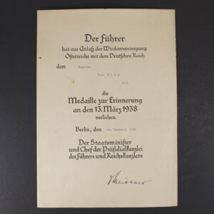 Front view of a WW2-era German Austria Occupation award document, showing the printed text, emblem, and layout.