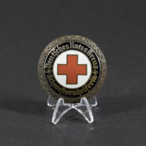 Overview of a WWII German DRK Schwesterhelferin brooch, showing the complete badge