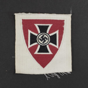 Front view of a WWII Kyffhäuserbund cloth sleeve insignia, showing the shield‑shaped patch with its embroidered design. The central motif, colors, stitching, and fabric texture are clearly visible.