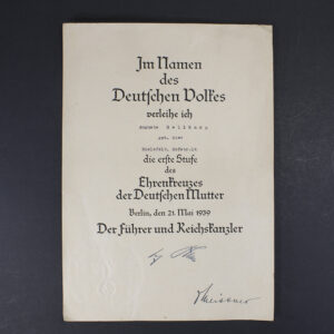 Front view of a WW2 German Golden Mother’s Cross award document showing the printed text and layout.