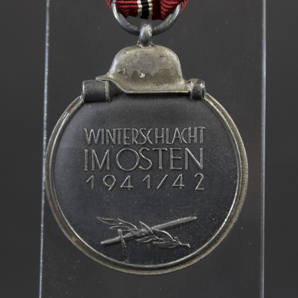 Reverse of German WW2 Eastern Front Medal showing date and snow battle detail
