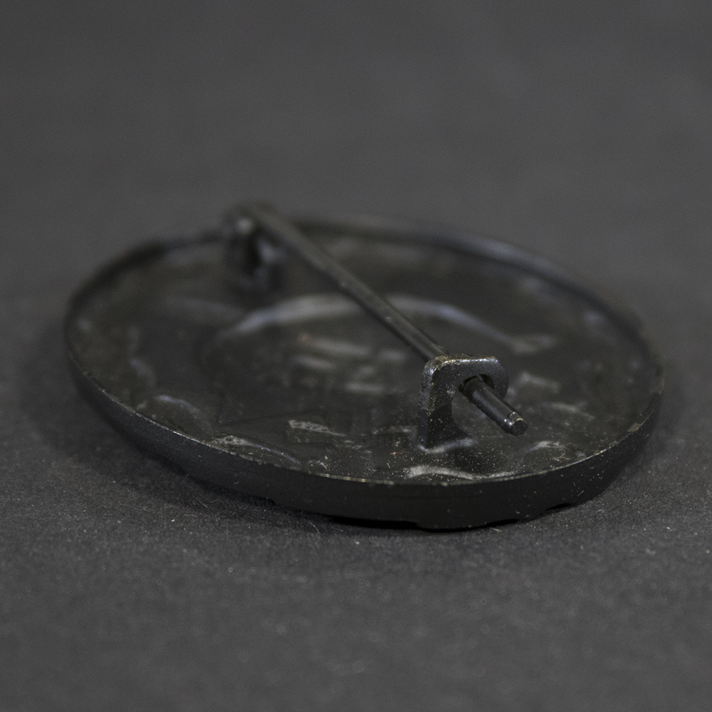 Close-up of hook on WW2 Black Wound Badge showing attachment detail